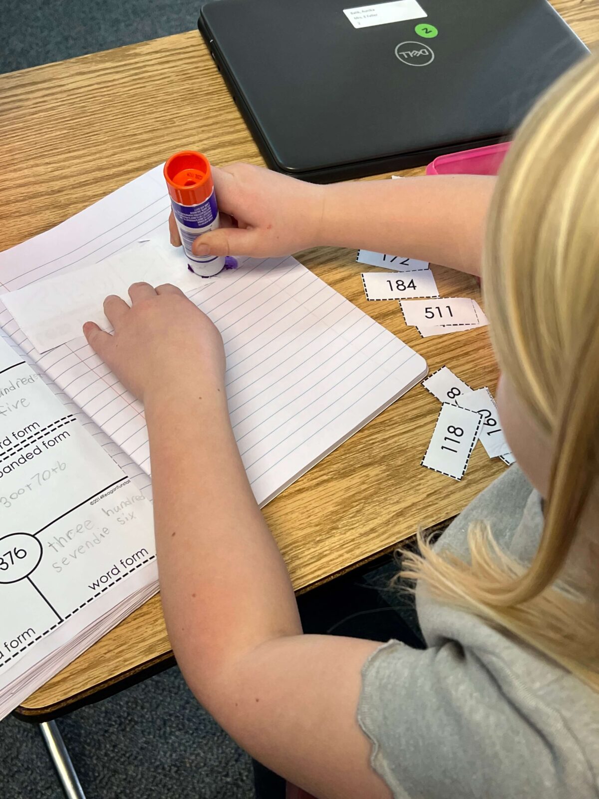 students at different math workstations