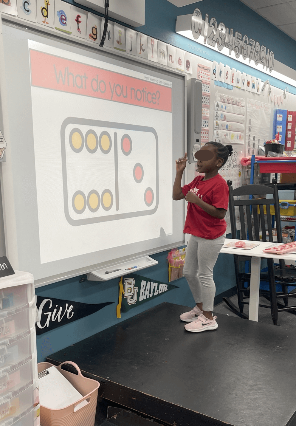 Kindergarten students using addition