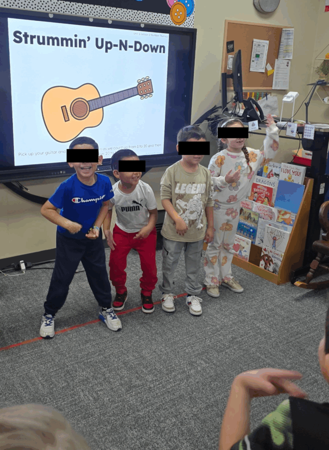 Students participating in an active math lesson using movement and math routines to build understanding