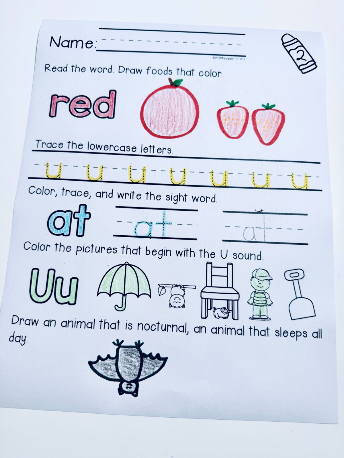 Kindergarten daily language spiral review worksheet with sight word practice, lowercase letter tracing, short u phonics activities, and beginning sound identification
