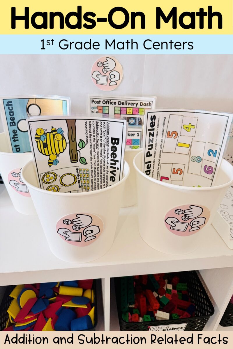 Labeled math center tubs holding Beehive Bonds, Bar Model Puzzles, Bonding at the Beach, and Post Office Delivery Dash activities.